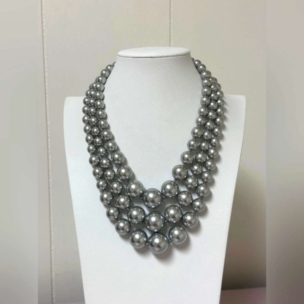 Vintage Richelieu 3 strand pearl necklace. Silver tone. 28”.  156grams